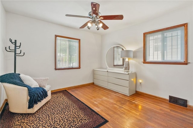 3261 Central Ave, Brighton Heights, PA 15212 - living area with light wood finished floors, ceiling fan, and baseboards