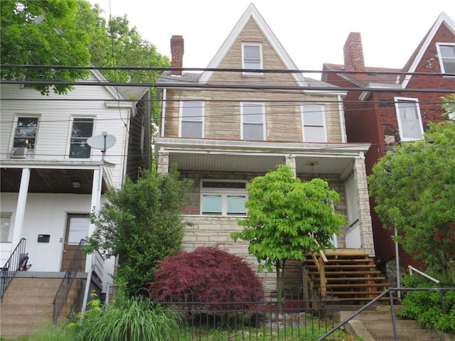 320 Woodward Ave, Mckees Rocks, PA 15136 - view of front of home with a chimney