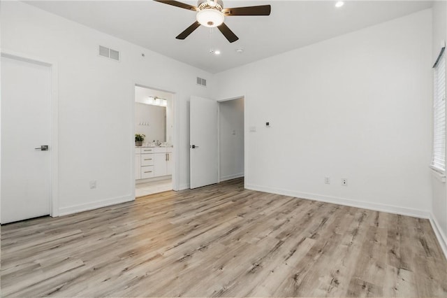 5523 Butler St, Lawrenceville, PA 15201 - unfurnished bedroom featuring light wood finished floors, ensuite bath, recessed lighting, and baseboards