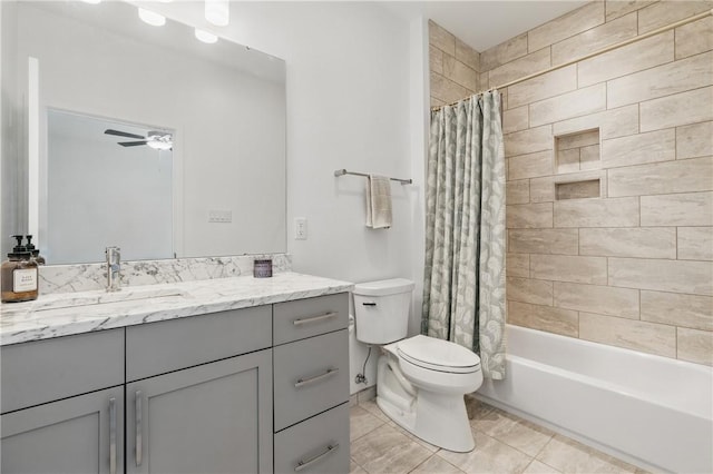 5523 Butler St, Lawrenceville, PA 15201 - bathroom with vanity, toilet, ceiling fan, shower / bath combination with curtain, and tile patterned flooring