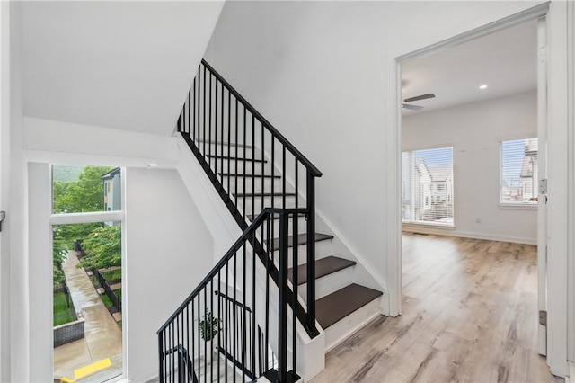 5523 Butler St, Lawrenceville, PA 15201 - staircase featuring healthy amount of natural light, wood finished floors, a ceiling fan, baseboards, and recessed lighting