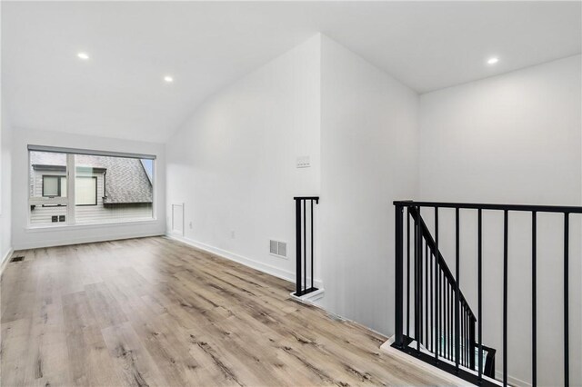 5523 Butler St, Lawrenceville, PA 15201 - bonus room featuring wood finished floors, lofted ceiling, recessed lighting, and baseboards