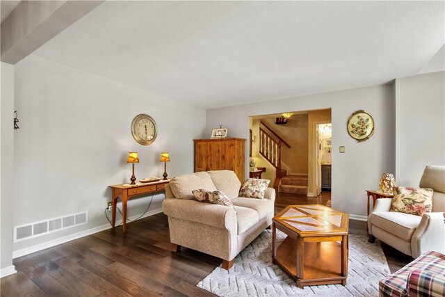 5743 Villahaven Dr, Bethel Park, PA 15236 - living room featuring stairway, wood finished floors, and baseboards