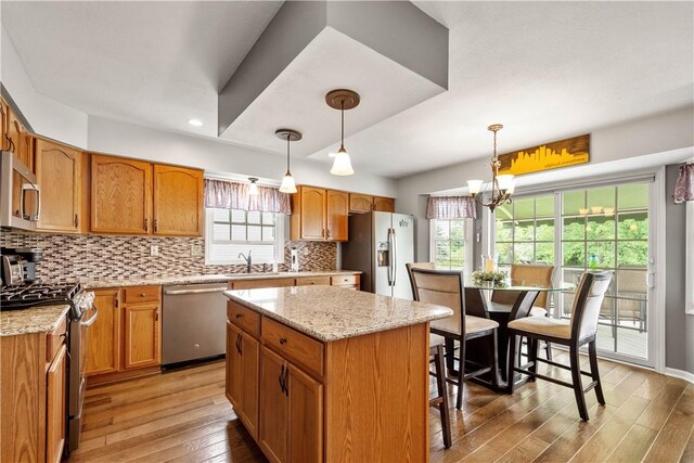 5743 Villahaven Dr, Bethel Park, PA 15236 - kitchen featuring stainless steel appliances, hardwood / wood-style flooring, a sink, healthy amount of natural light, and recessed lighting
