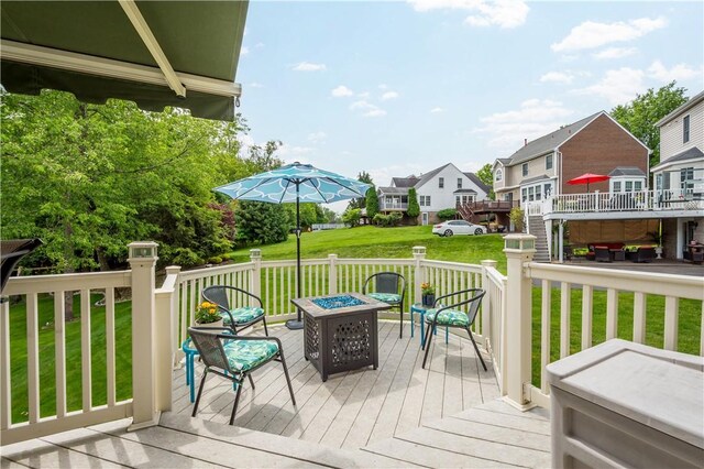 5743 Villahaven Dr, Bethel Park, PA 15236 - wooden deck featuring a residential view, a fire pit, and a lawn