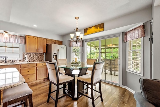 5743 Villahaven Dr, Bethel Park, PA 15236 - dining area with a chandelier, baseboards, healthy amount of natural light, wood finished floors, and recessed lighting