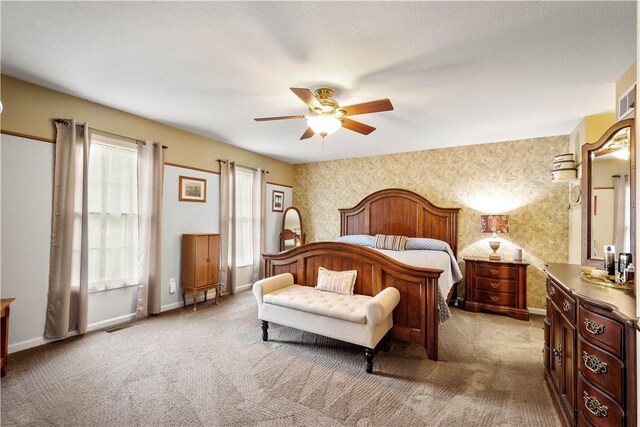 5743 Villahaven Dr, Bethel Park, PA 15236 - bedroom featuring light colored carpet, wallpapered walls, ceiling fan, and baseboards