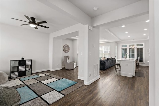 2008 Ashton Row, South Fayette, PA 15017 - foyer entrance with dark wood-style floors, baseboards, a chandelier, a ceiling fan, and recessed lighting