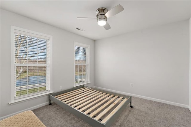 2008 Ashton Row, South Fayette, PA 15017 - unfurnished bedroom featuring carpet, baseboards, and a ceiling fan