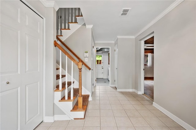2525 Chapelwood Dr, Upper St Clair, PA 15241 - foyer featuring crown molding, baseboards, stairway, and light tile patterned floors