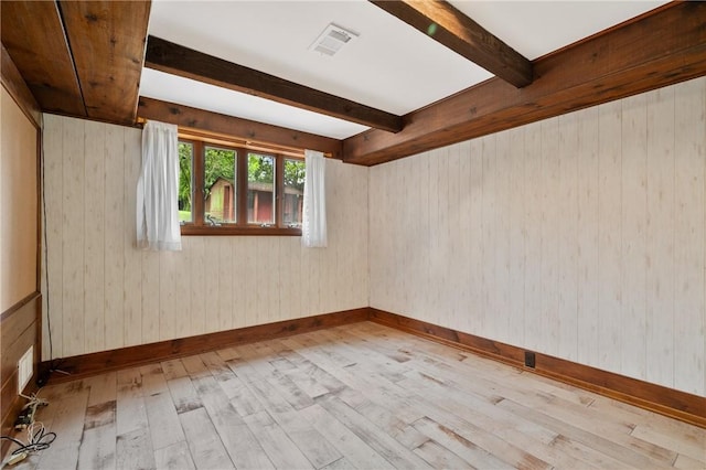 2525 Chapelwood Dr, Upper St Clair, PA 15241 - spare room featuring light wood finished floors, beam ceiling, baseboards, and wood walls