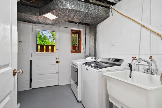 2525 Chapelwood Dr, Upper St Clair, PA 15241 - washroom with tile patterned floors, washer and clothes dryer, and concrete block wall
