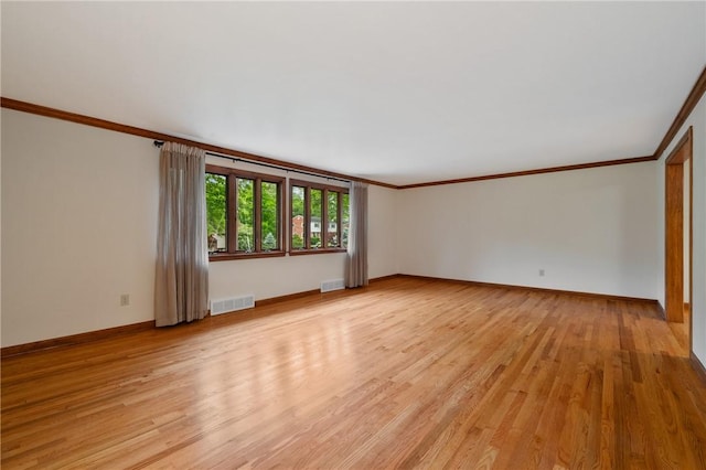 2525 Chapelwood Dr, Upper St Clair, PA 15241 - spare room featuring ornamental molding, light wood-style flooring, and baseboards