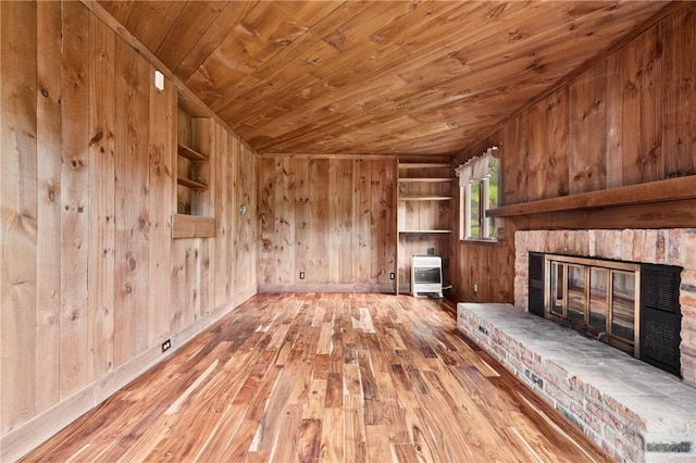 2525 Chapelwood Dr, Upper St Clair, PA 15241 - unfurnished living room with wooden walls, heating unit, hardwood / wood-style flooring, wood ceiling, and a fireplace