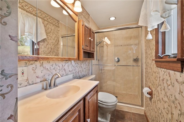 2525 Chapelwood Dr, Upper St Clair, PA 15241 - bathroom with toilet, a stall shower, vanity, wallpapered walls, and tile patterned flooring
