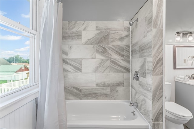 1222 Forest Ave, New Kensington, PA 15068 - full bath featuring shower / tub combo, toilet, and plenty of natural light