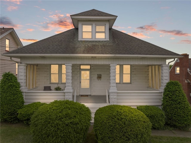 1222 Forest Ave, New Kensington, PA 15068 - view of front of house with covered porch and a shingled roof