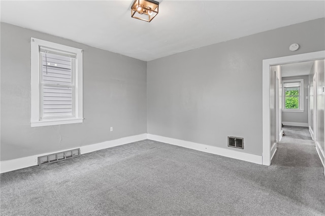 1222 Forest Ave, New Kensington, PA 15068 - spare room featuring carpet floors, baseboards, and a smoke detector