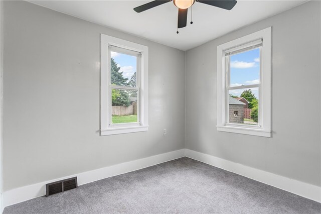 1222 Forest Ave, New Kensington, PA 15068 - spare room with plenty of natural light, carpet floors, baseboards, and ceiling fan