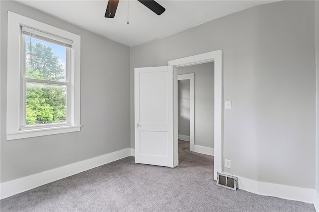 1222 Forest Ave, New Kensington, PA 15068 - unfurnished bedroom with carpet flooring, baseboards, and ceiling fan