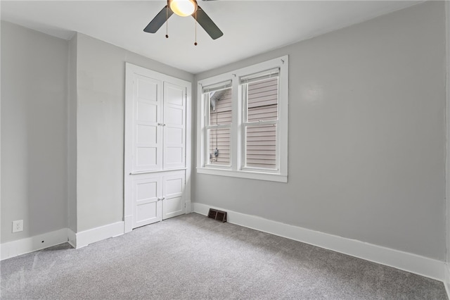 1222 Forest Ave, New Kensington, PA 15068 - unfurnished bedroom featuring carpet, baseboards, and ceiling fan