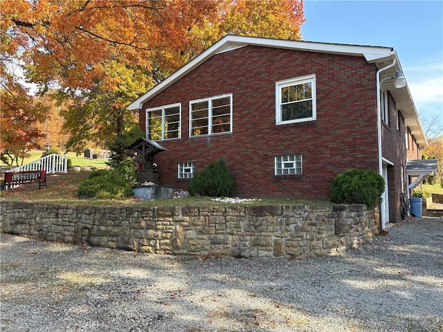 1877 Main St, Arona, PA 15617 - view of side of home with brick siding