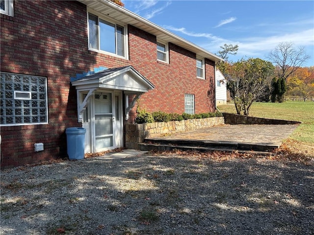 1877 Main St, Arona, PA 15617 - back of house featuring brick siding