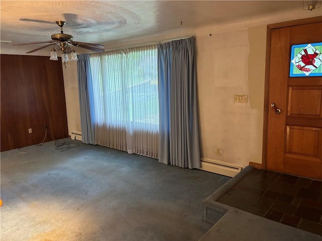 1877 Main St, Arona, PA 15617 - entrance foyer featuring ceiling fan, a baseboard heating unit, and carpet floors