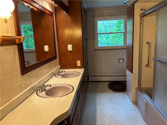 1877 Main St, Arona, PA 15617 - full bathroom featuring a baseboard radiator, healthy amount of natural light, tile patterned floors, and double vanity