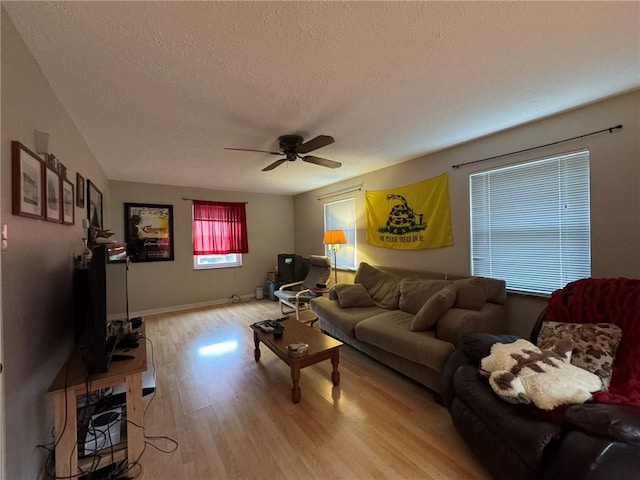 1022-1024 S Trenton Ave, Regent Square, PA 15221 - living area featuring a textured ceiling, light wood-type flooring, a ceiling fan, and baseboards