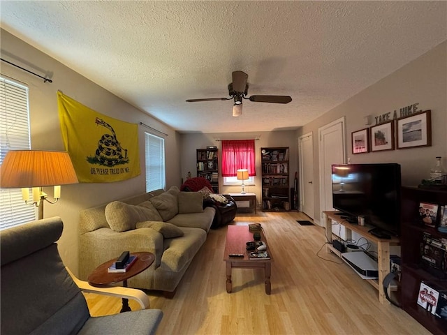 1022-1024 S Trenton Ave, Regent Square, PA 15221 - living area featuring light wood-style flooring, ceiling fan, and a textured ceiling