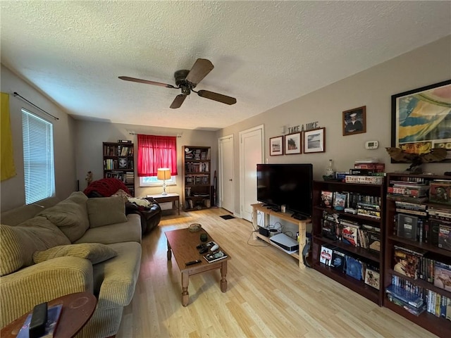 1022-1024 S Trenton Ave, Regent Square, PA 15221 - living room featuring a textured ceiling, wood finished floors, and ceiling fan