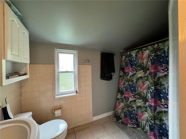 1022-1024 S Trenton Ave, Regent Square, PA 15221 - full bath with tile patterned flooring, toilet, tile walls, and curtained shower