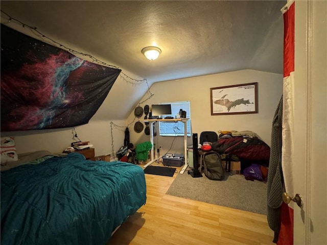1022-1024 S Trenton Ave, Regent Square, PA 15221 - bedroom featuring wood finished floors and lofted ceiling