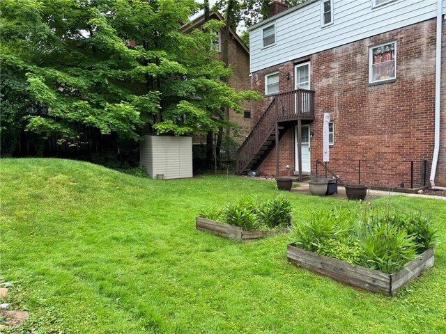 1022-1024 S Trenton Ave, Regent Square, PA 15221 - view of grassy yard with a vegetable garden and stairway
