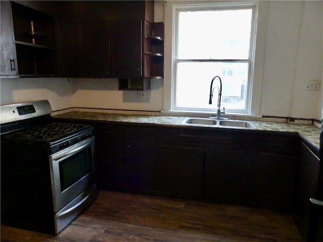 1112 Wade St, Aliquippa, PA 15001 - kitchen with stainless steel range with gas stovetop, open shelves, a sink, dark wood-type flooring, and plenty of natural light