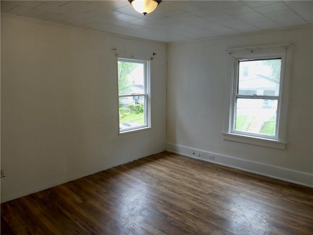 1112 Wade St, Aliquippa, PA 15001 - empty room featuring wood finished floors and ornamental molding