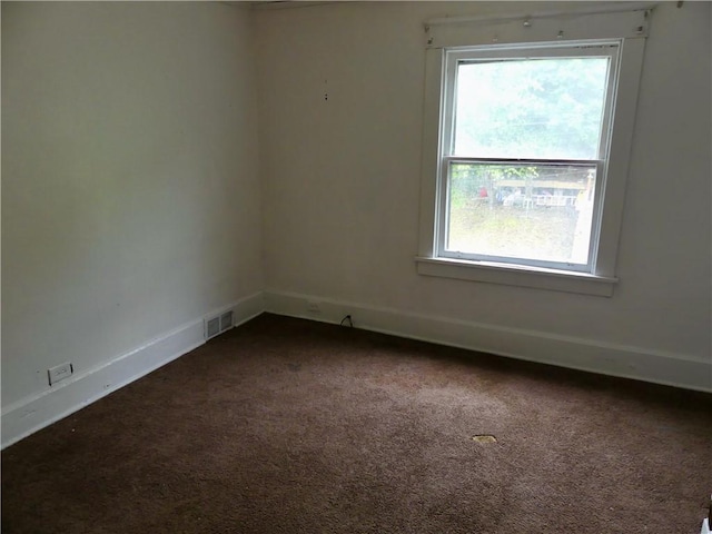 1112 Wade St, Aliquippa, PA 15001 - unfurnished room featuring dark carpet and baseboards