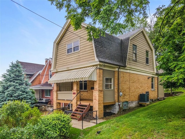 44 Pasadena St, Mt Washington, PA 15211 - rear view of property featuring a gambrel roof, a shingled roof, central AC, and brick siding