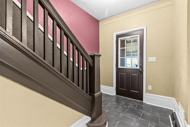 44 Pasadena St, Mt Washington, PA 15211 - entrance foyer with stairs, a textured wall, baseboards, and a textured ceiling