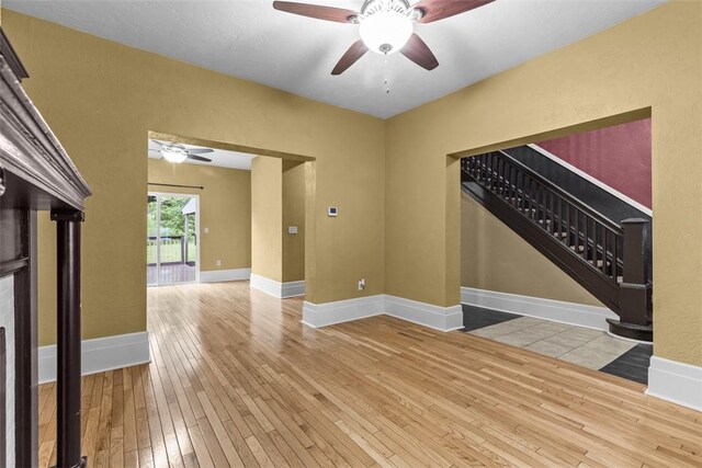 44 Pasadena St, Mt Washington, PA 15211 - spare room with ceiling fan, light wood finished floors, stairway, and baseboards