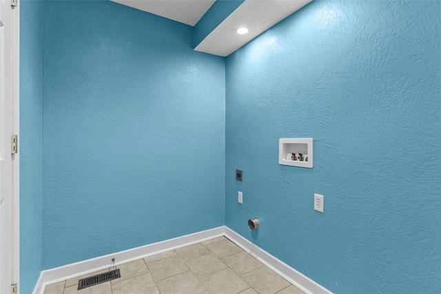 44 Pasadena St, Mt Washington, PA 15211 - laundry area with washer hookup, electric dryer hookup, baseboards, and light tile patterned flooring