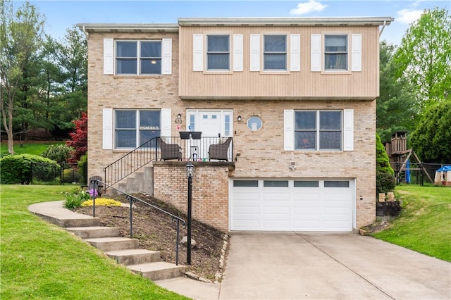 533 Hickory Ln, Chartiers, PA 15342 - view of front of house with a garage, driveway, and brick siding