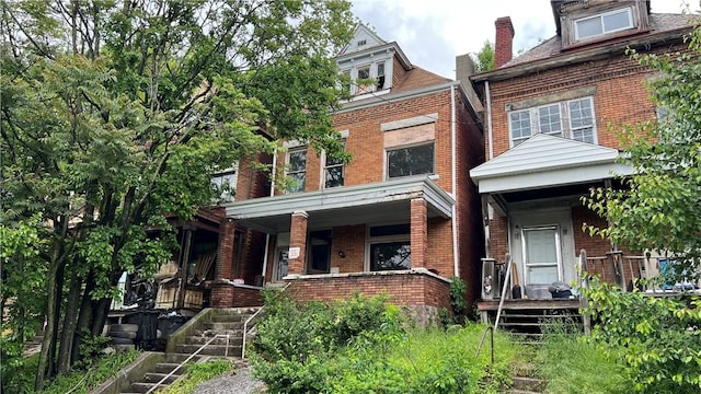 222 Luray St, Perry Hilltop, PA 15214 - view of front of home featuring covered porch and brick siding