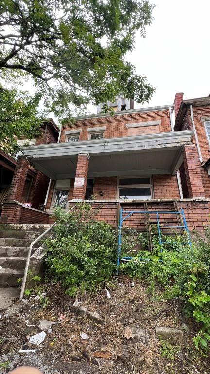 222 Luray St, Perry Hilltop, PA 15214 - back of property featuring brick siding and mansard roof