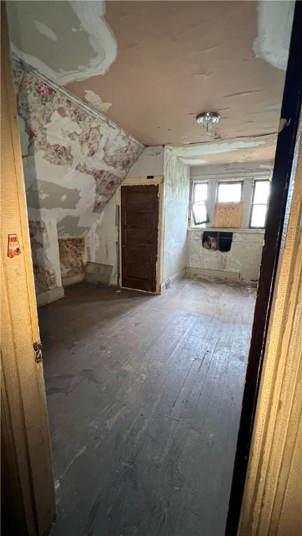 222 Luray St, Perry Hilltop, PA 15214 - bathroom featuring vaulted ceiling and wood-type flooring