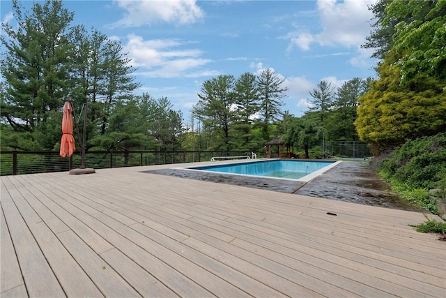 428 Jefferson School Rd, Cook Twp, PA 15658 - view of pool featuring a wooden deck and view of wooded area