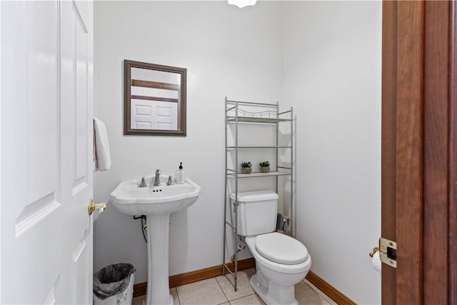 704 Park Ave, Rostraver, PA 15012 - bathroom featuring toilet, tile patterned flooring, and baseboards