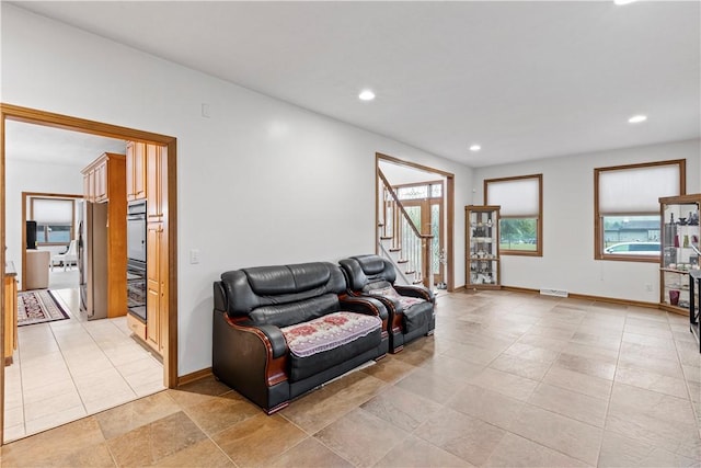 704 Park Ave, Rostraver, PA 15012 - sitting room featuring stairway, plenty of natural light, baseboards, and recessed lighting
