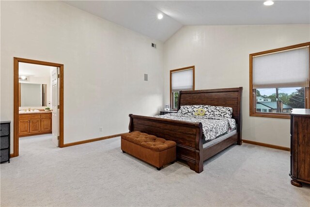 704 Park Ave, Rostraver, PA 15012 - bedroom with light colored carpet, baseboards, high vaulted ceiling, a sink, and ensuite bathroom